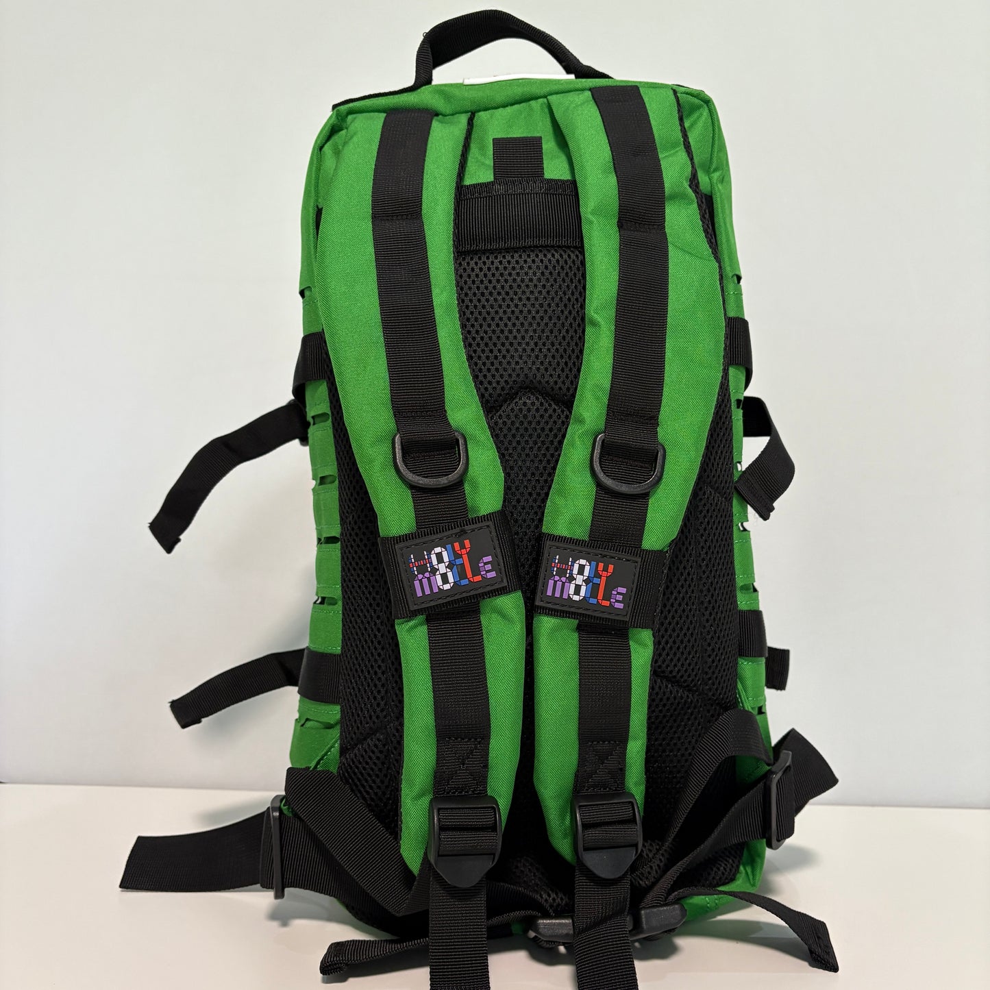 The FOREST Slimline Backpack with Laser Cut Molle in Green- 25L