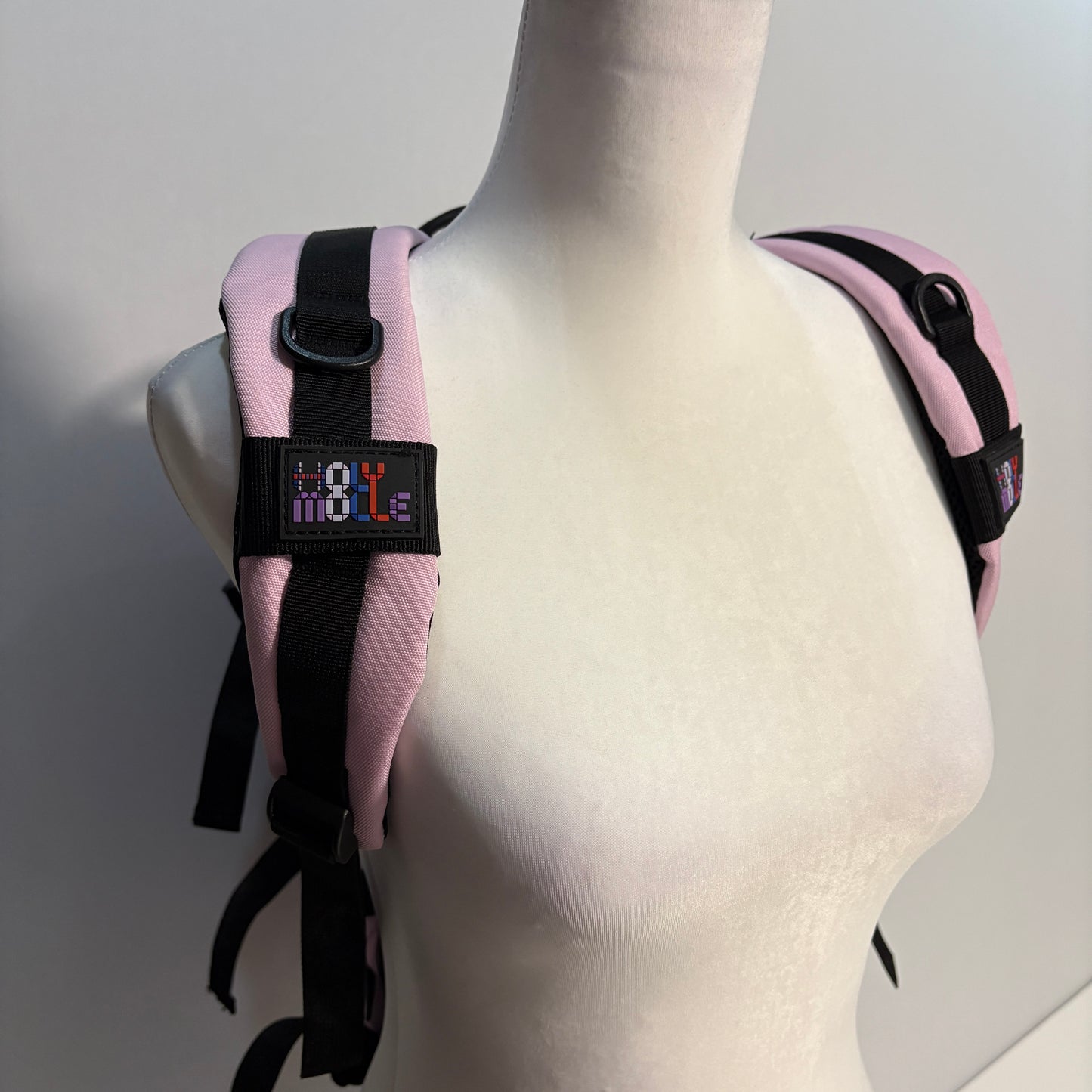 The COTTON CANDY Slimline Backpack with Laser Cut Molle in Pink - 25L