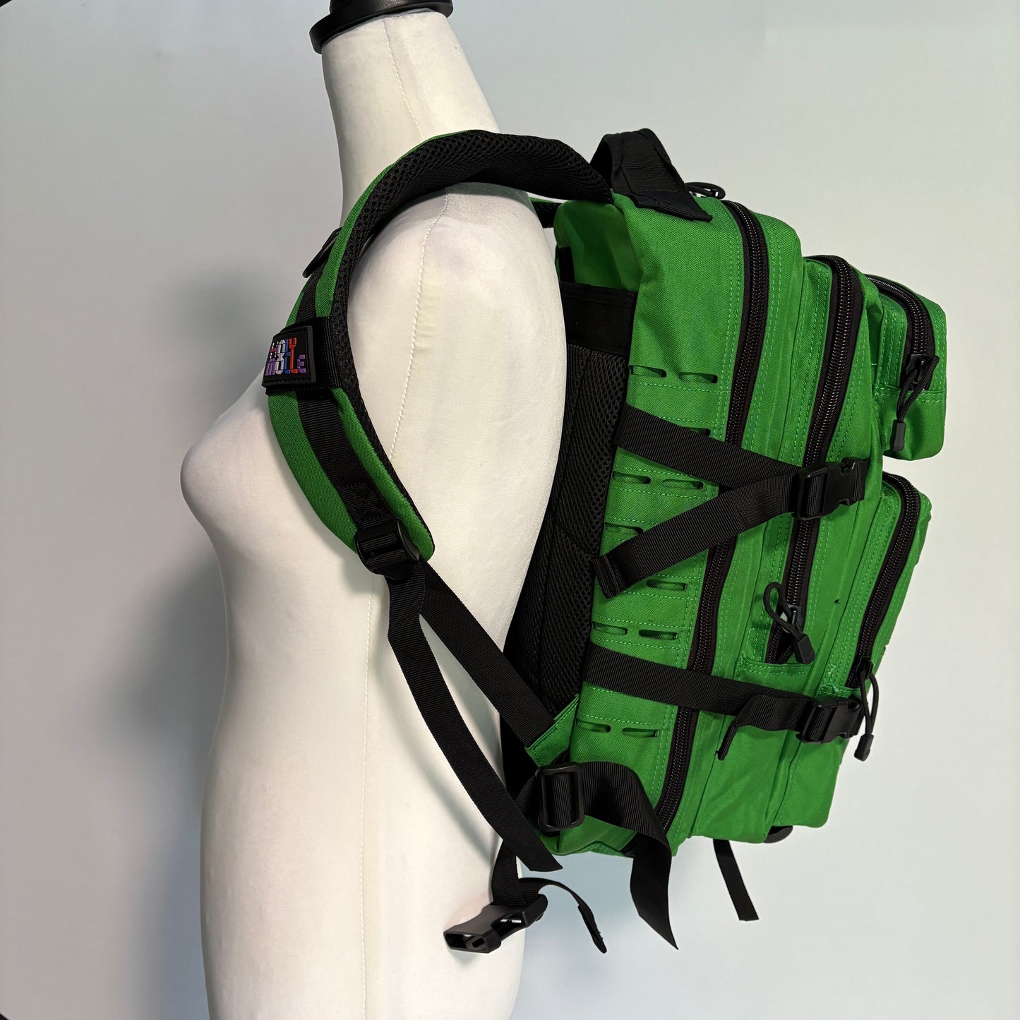 The FOREST Slimline Backpack with Laser Cut Molle in Green- 25L