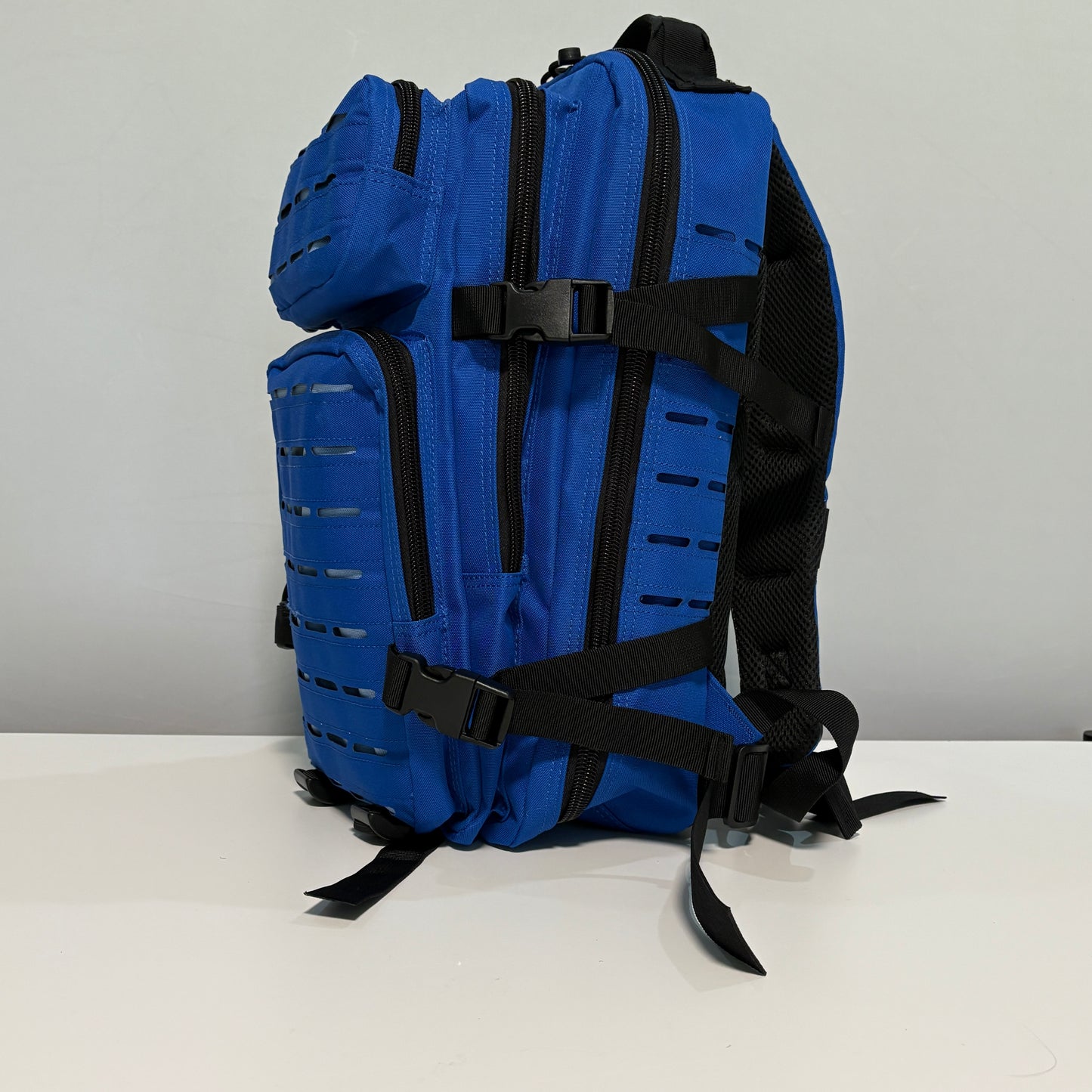 The OCEAN Slimline Backpack with Laser Cut Molle in Blue - 25L