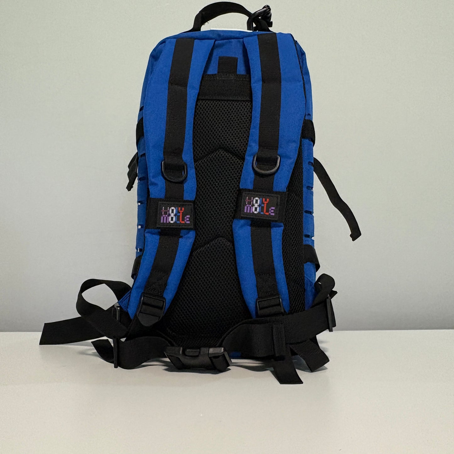 The OCEAN Slimline Backpack with Laser Cut Molle in Blue - 25L