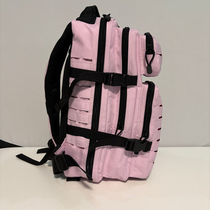 The COTTON CANDY Slimline Backpack with Laser Cut Molle in Pink - 25L