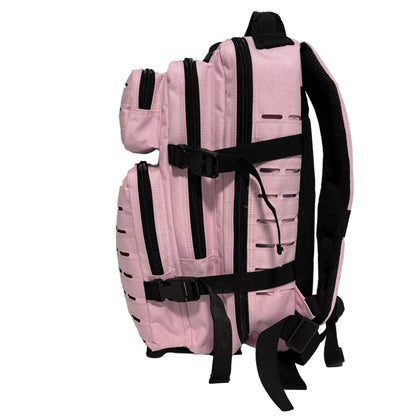 Pink backpack with black straps on a white surface and light gray background