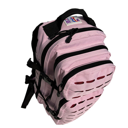 Pink backpack with black straps on a white surface